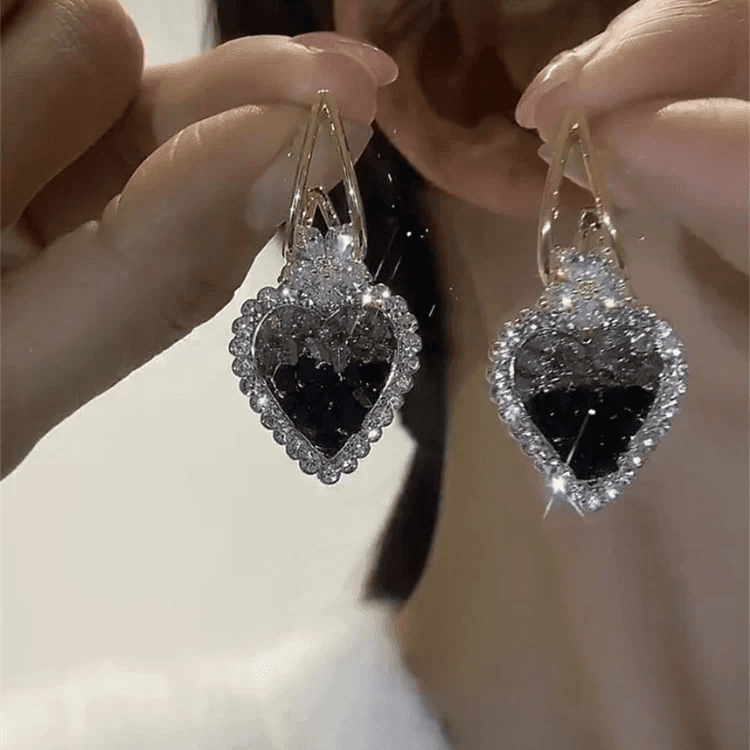 Earrings with hearts in green crystal