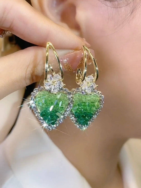 Earrings with hearts in green crystal